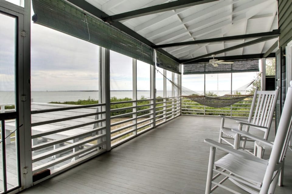 Screen porch. Catch the SW breeze.