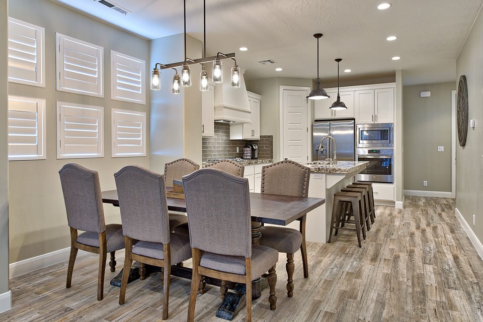 Dining Table - With an open and spacious floor plan, the Dining Room and Kitchen can accommodate meal preparations for groups large or small.