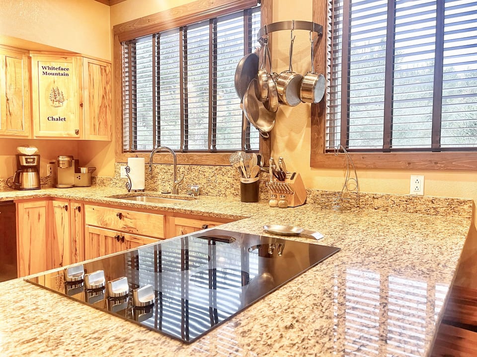 Spacious, beautiful kitchen is fully equipped to make meals at home.