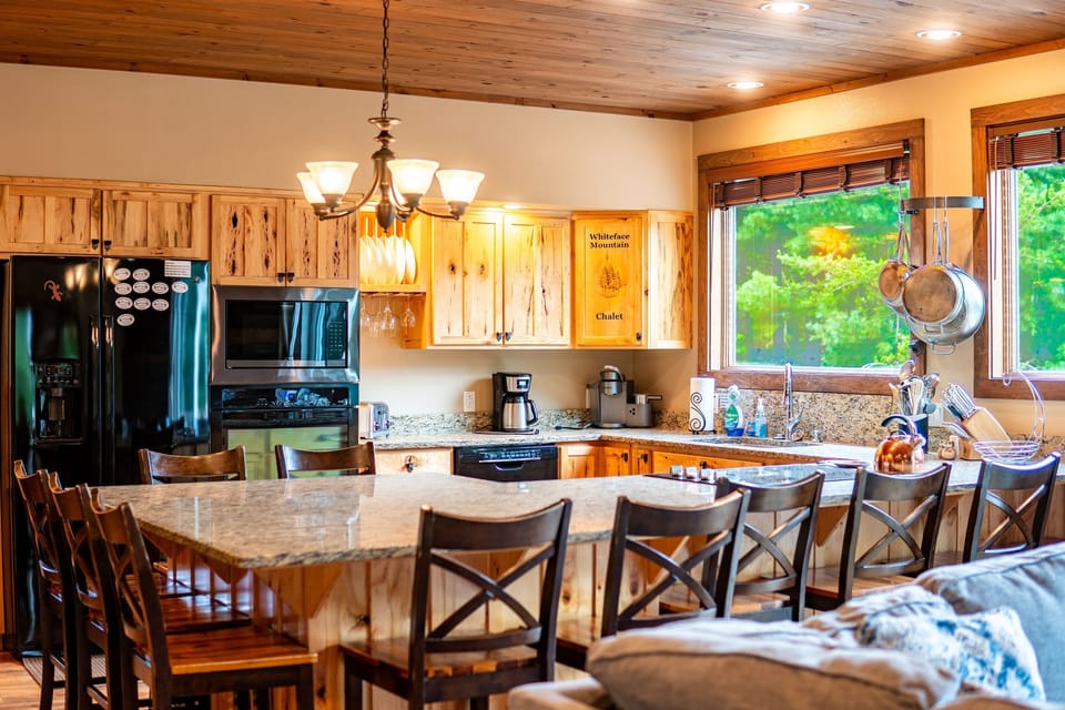 Seating around the large granite table is fantastic for sharing meals and making memories. 