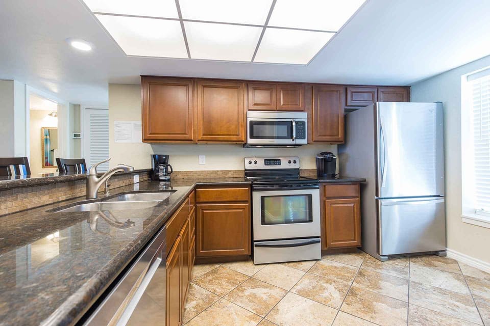 The granite countertops add great style and are easy to work on.
