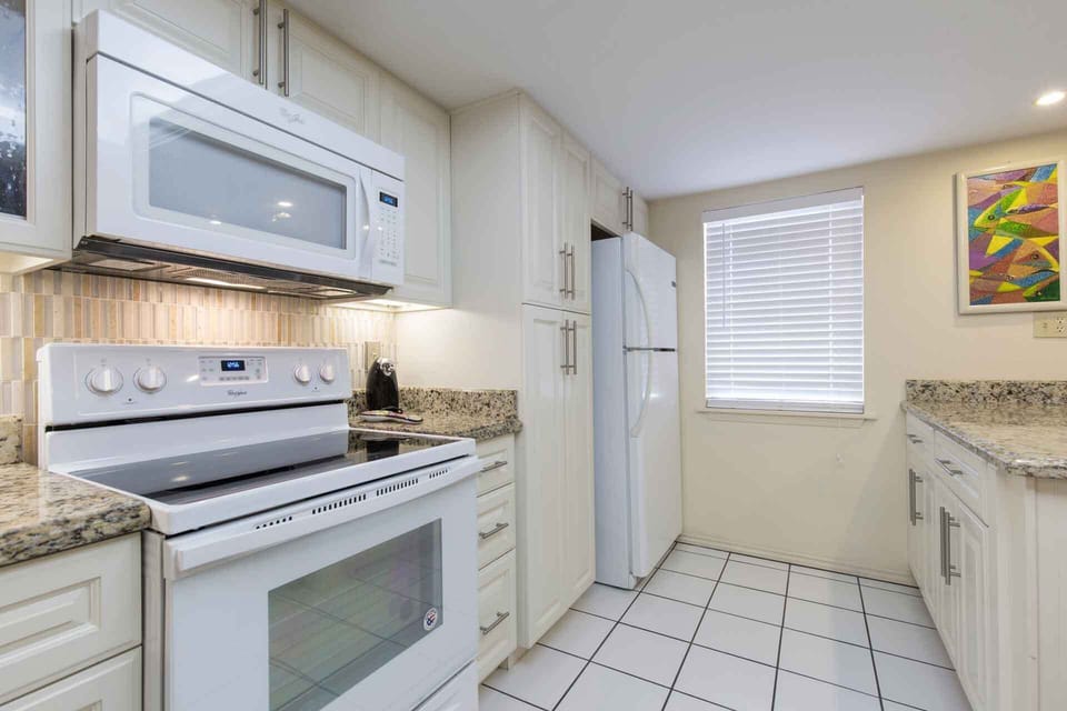 The kitchen is fully equipped with everything you might need to prepare delicious meals.