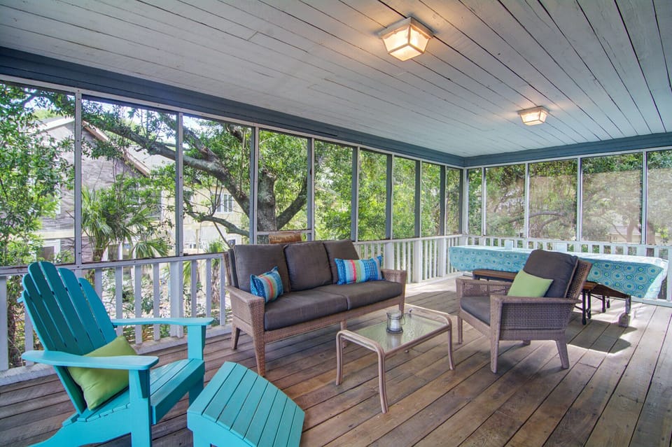 Spacious screen porch off the kitchen.