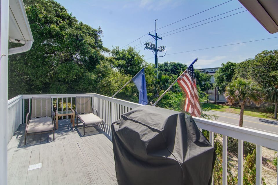 Deck with gas grill.