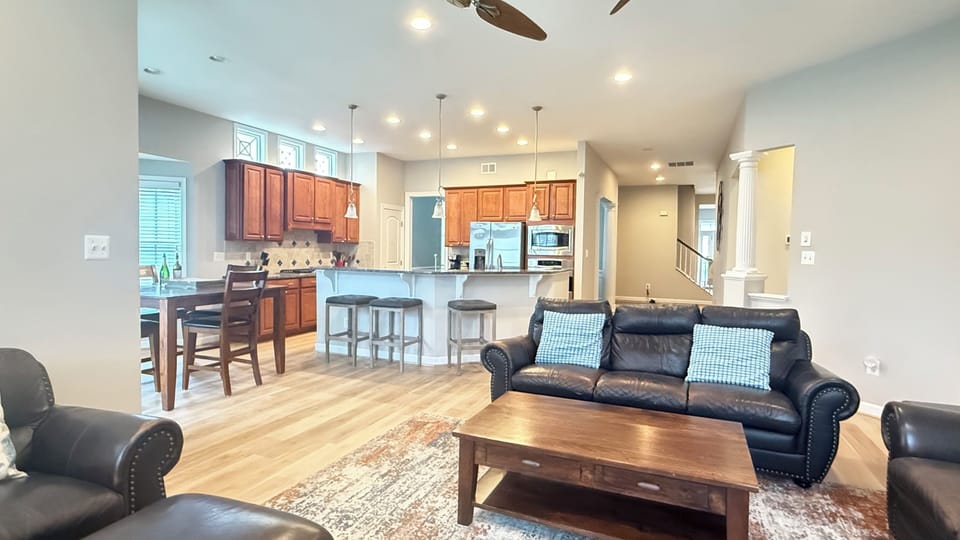Open kitchen concept with stainless appliances