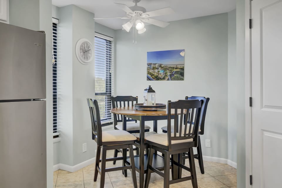 Breakfast table for four off kitchen.