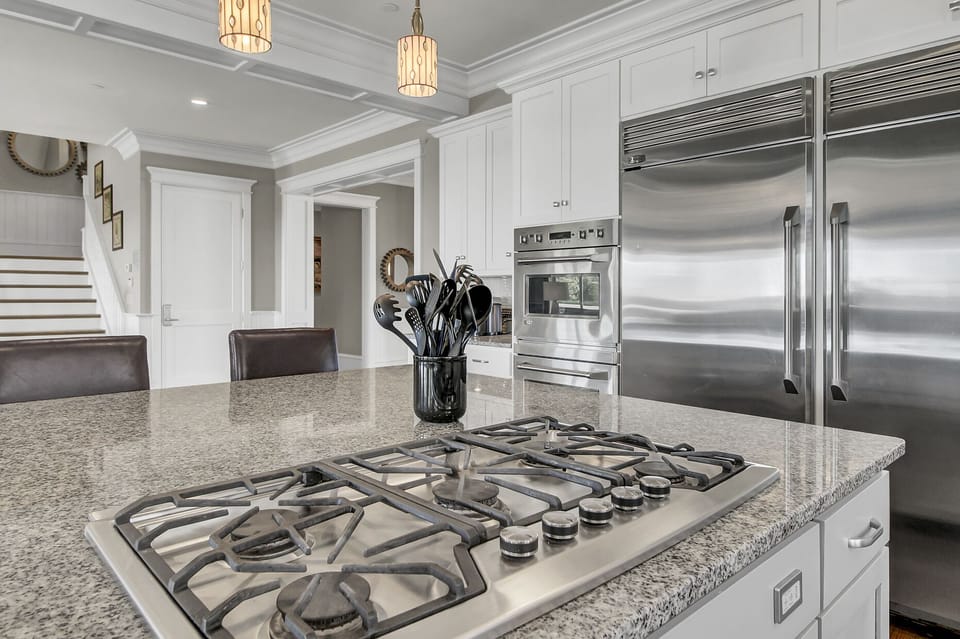  Kitchen features high-end stainless steel appliances.
