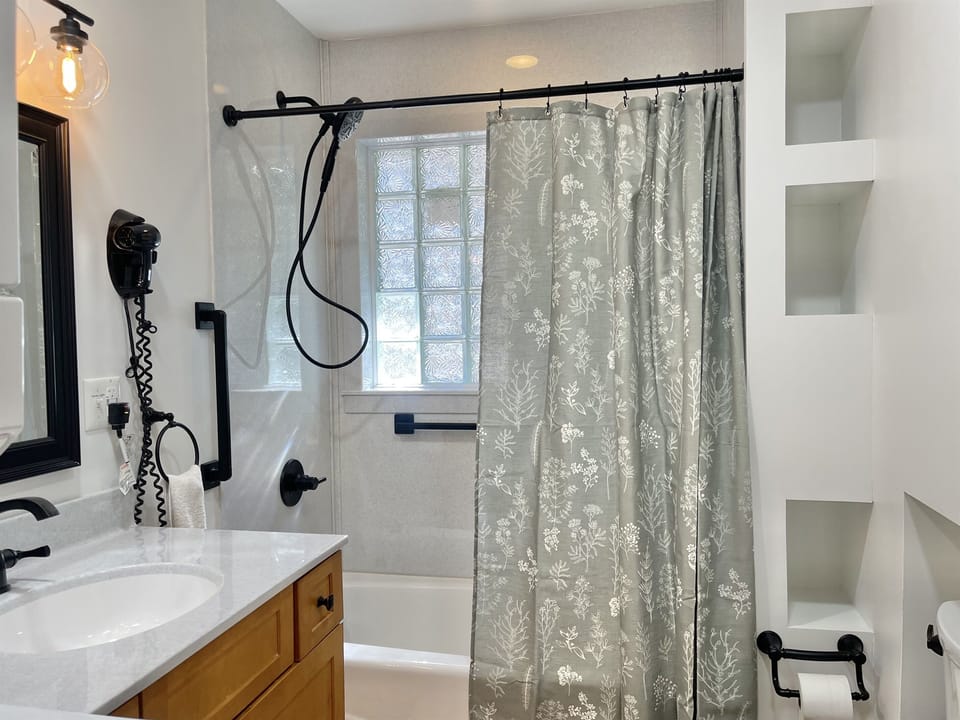 Bathroom 1 on the main floor has a shower/tub combo and washer/dryer for your convenience