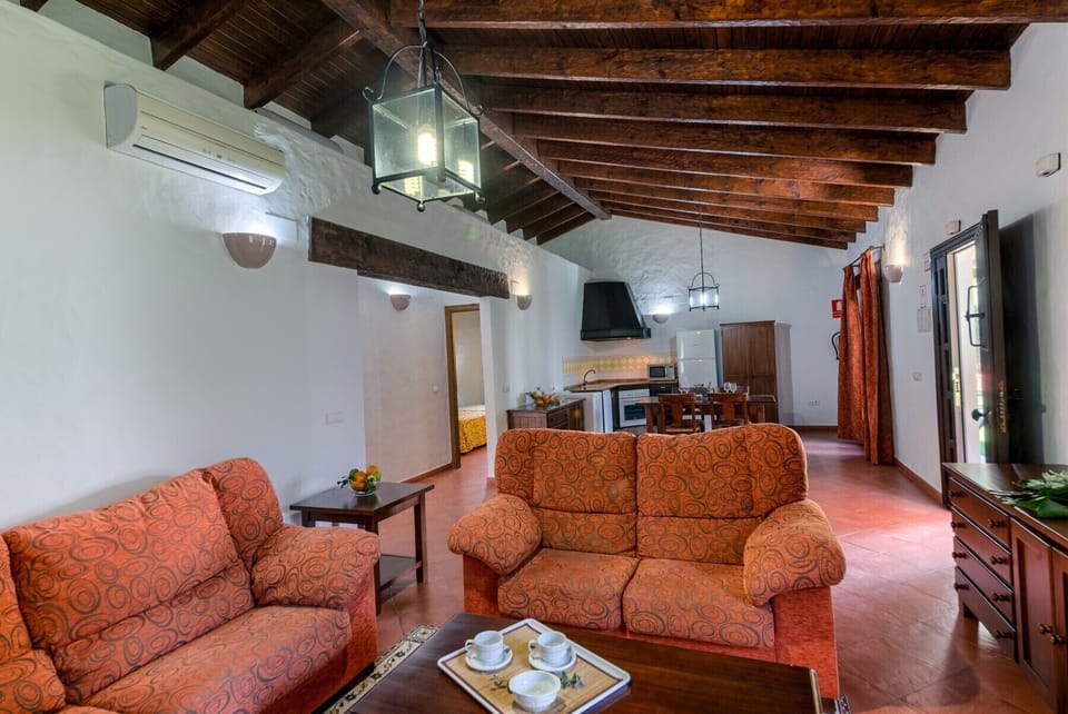 Sofás of El Palmeral and Los Naranjos country houses living room in Hacienda Roche Viejo in Conil
