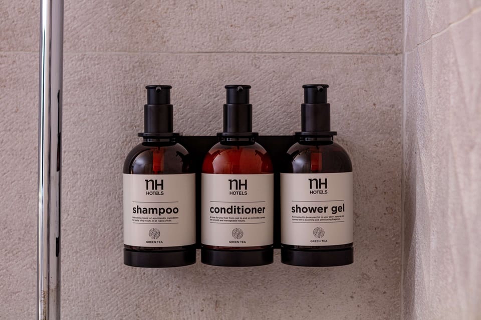Shower, eco-friendly toiletries, hair dryer, towels