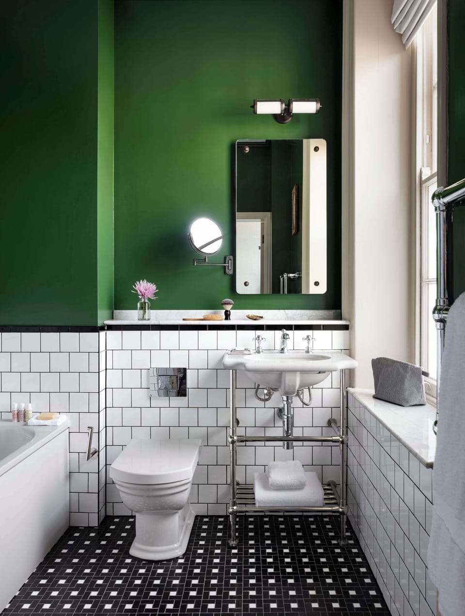 Designer toiletries, hair dryer, towels