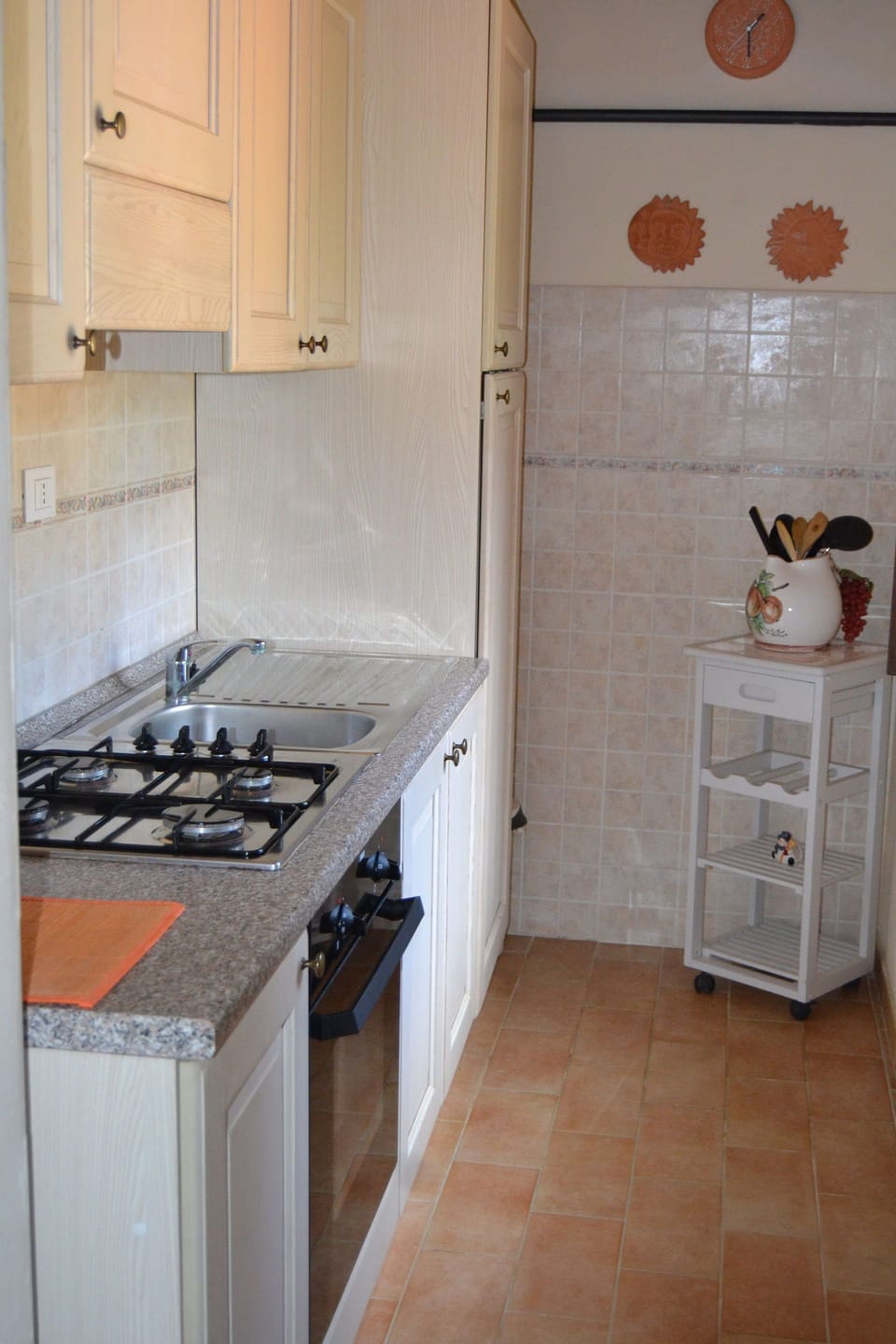 Room, Property, Kitchen, Countertop, Cabinetry, Tile, Major Appliance, Kitchen Stove, Floor, Furniture