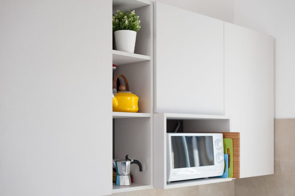 Apartment, 1 Bedroom | Private kitchen | Full-size fridge, microwave, oven, stovetop