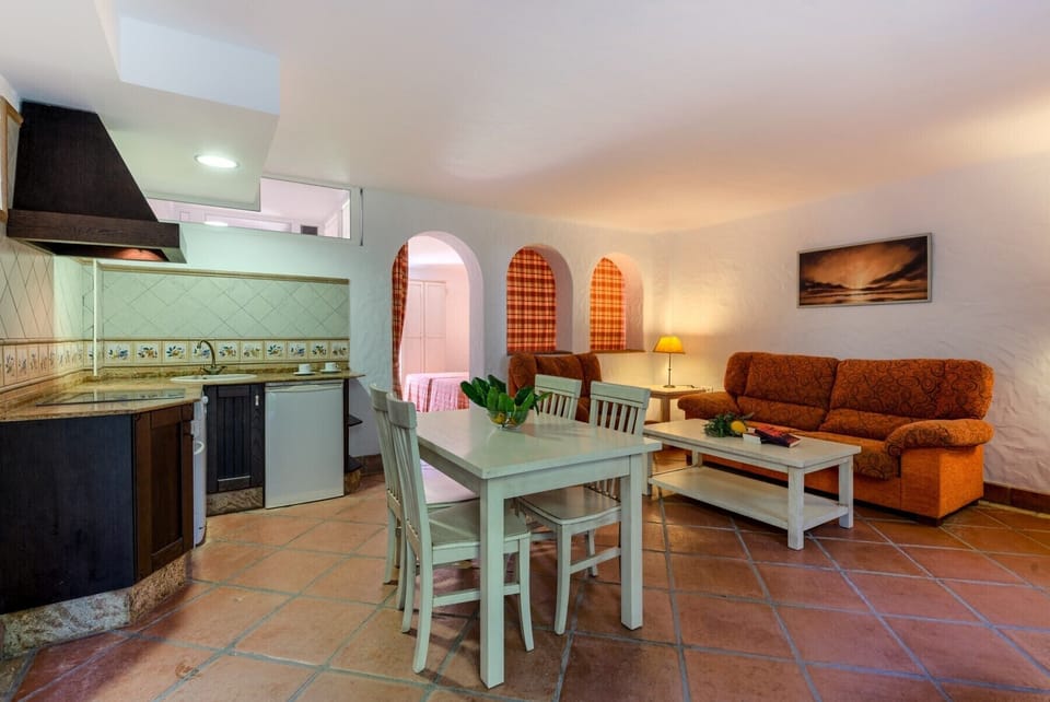Sofas and table of Lavanda and Romero apartments living room in Hacienda Roche Viejo in Conil