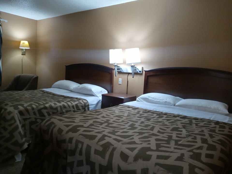 Room, 2 Double Beds | Desk, iron/ironing board, rollaway beds, free WiFi