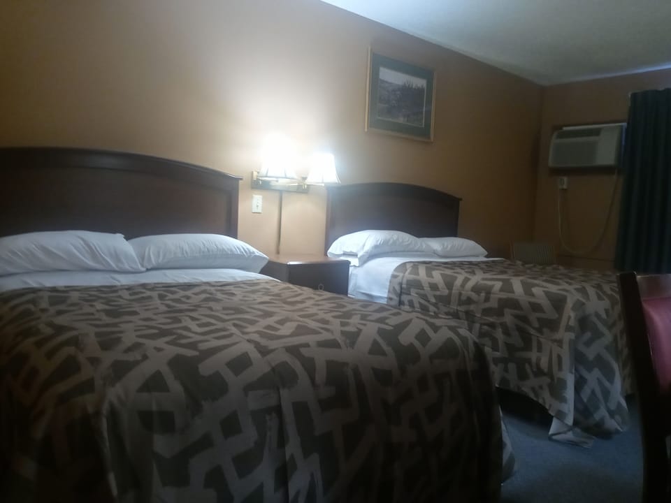 Room, 2 Double Beds | Desk, iron/ironing board, rollaway beds, free WiFi