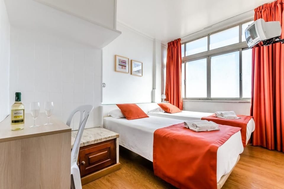 Double or Twin Room, Shared Bathroom | In-room safe, desk, blackout drapes, iron/ironing board