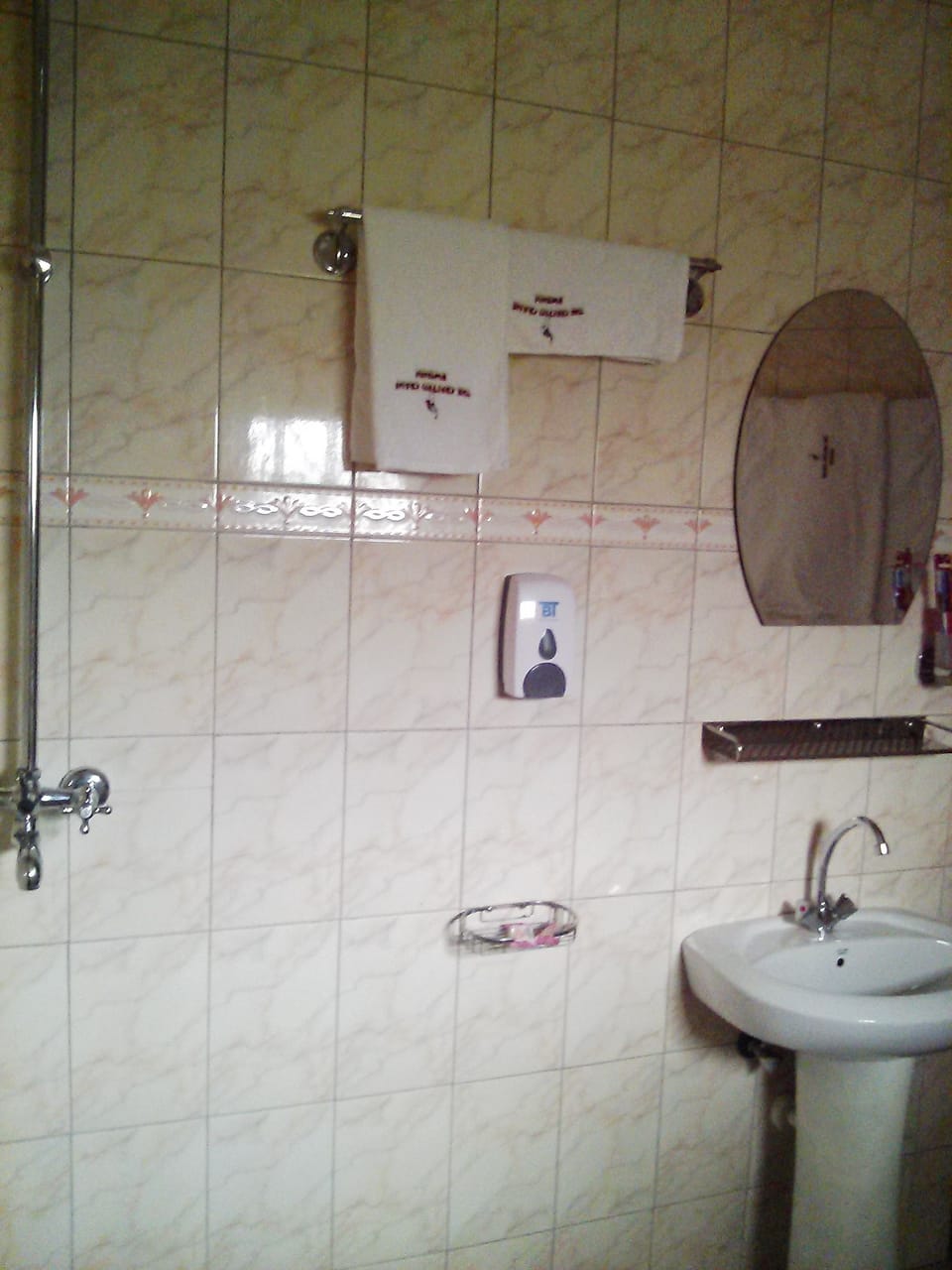 Shower, free toiletries, slippers, towels
