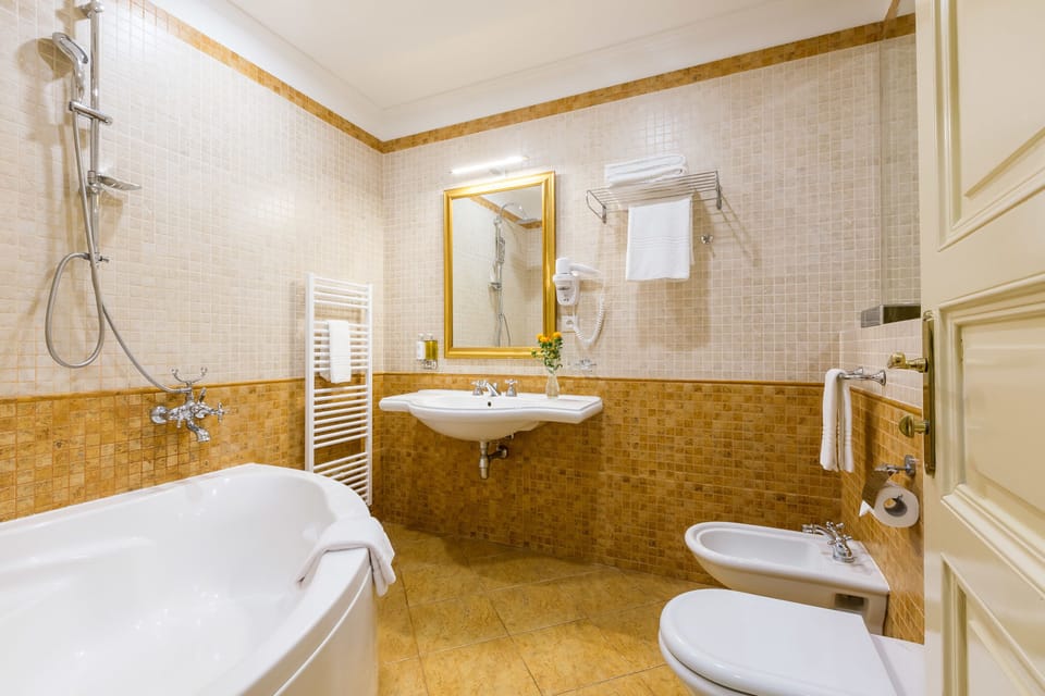 Two Bedroom Suite with Patio | Bathroom | Designer toiletries, hair dryer, slippers, bidet