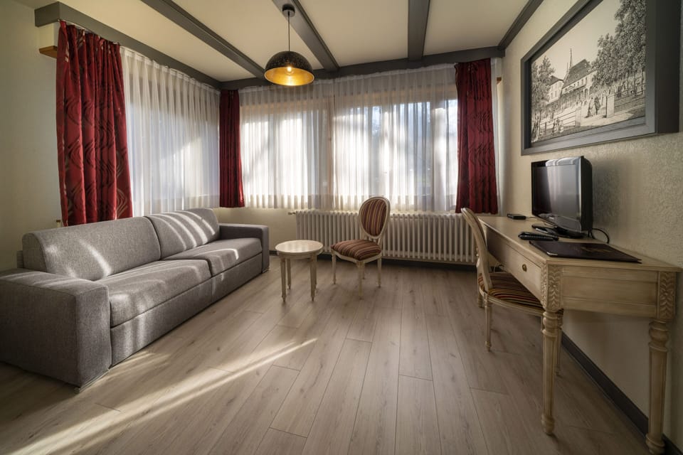 Standard Quadruple Room | Individually decorated, individually furnished, desk, blackout drapes