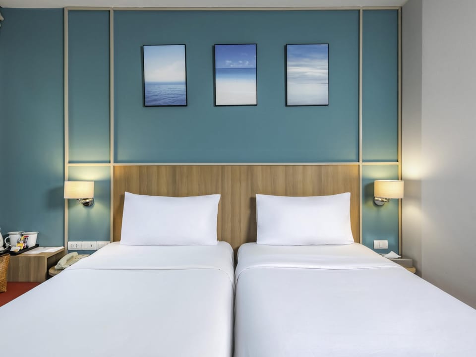 Standard Room, 2 Twin Beds | In-room safe, desk, iron/ironing board (on request), cribs (free)