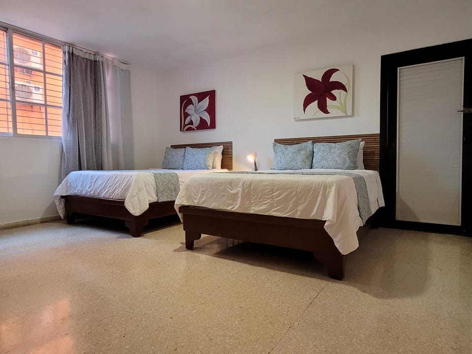 Double Room, 2 Double Beds | In-room safe, bed sheets