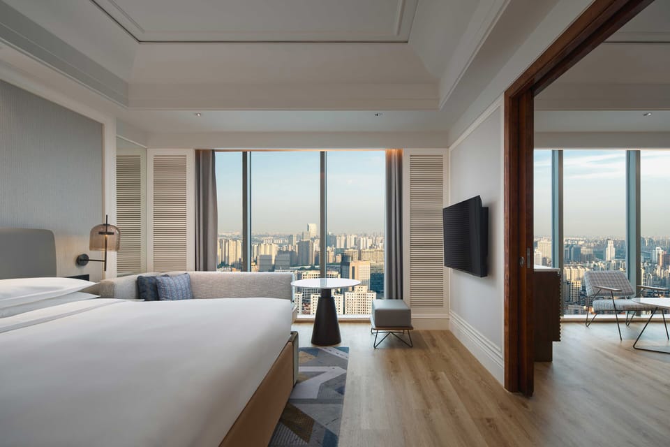 Premium bedding, down comforters, Select Comfort beds, minibar