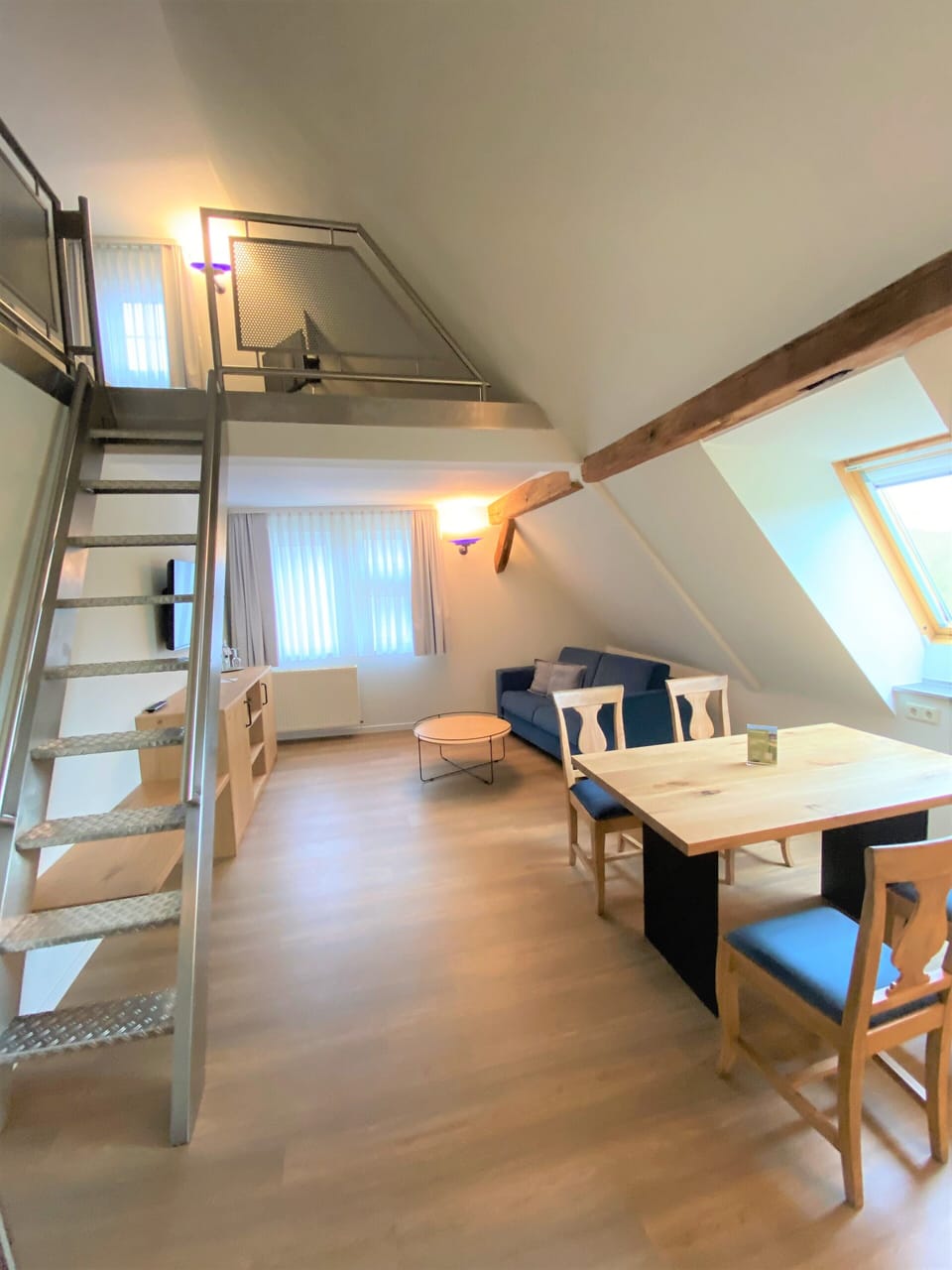Family Studio | Living area | 43-inch flat-screen TV with cable channels, TV