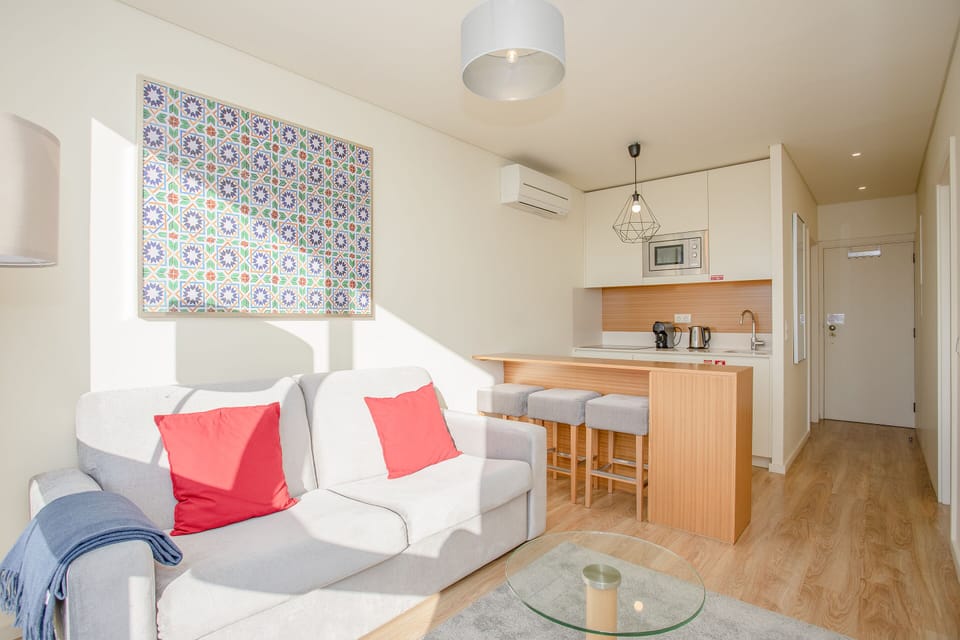 Apartment, 1 Bedroom, City View | Living area | Flat-screen TV
