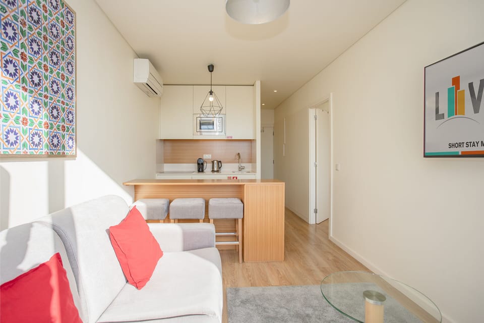 Apartment, 1 Bedroom, City View | Living area | Flat-screen TV