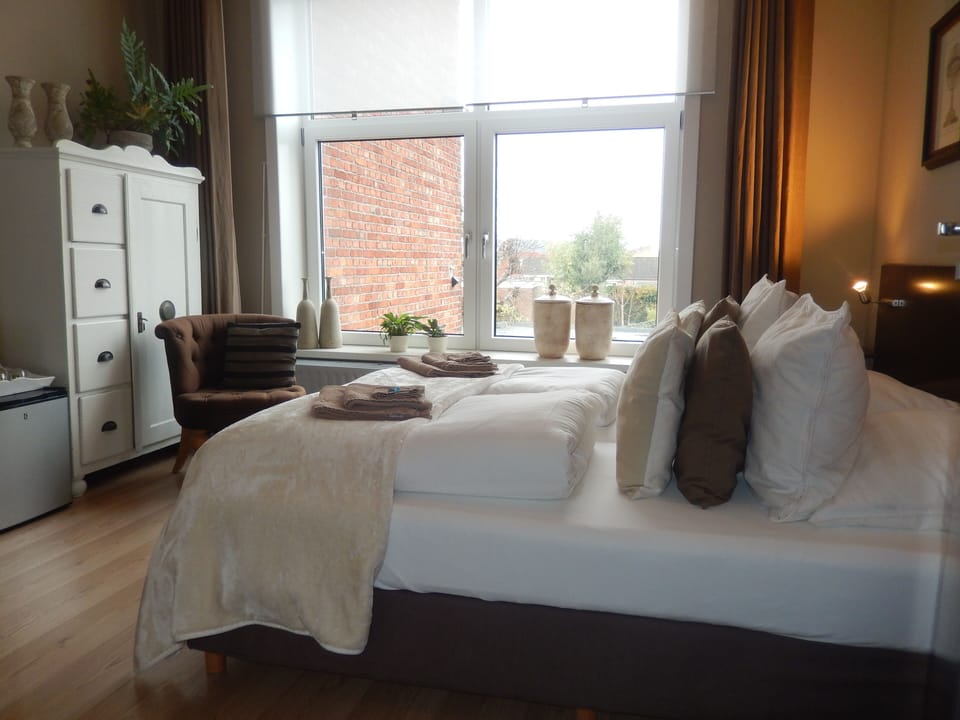 Blackout drapes, iron/ironing board, free WiFi, bed sheets