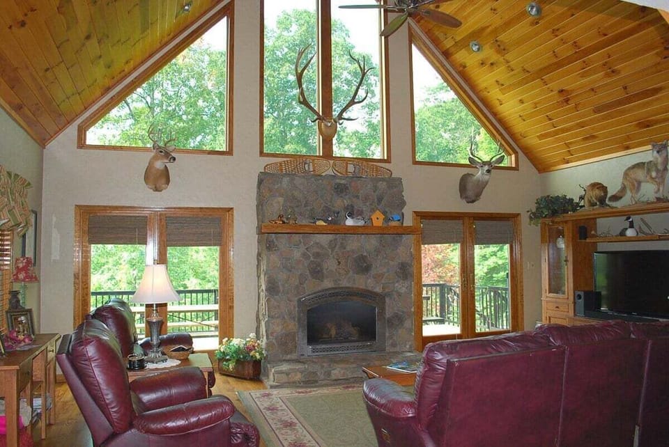 Living Room with Smart TV & Stone Fireplace
