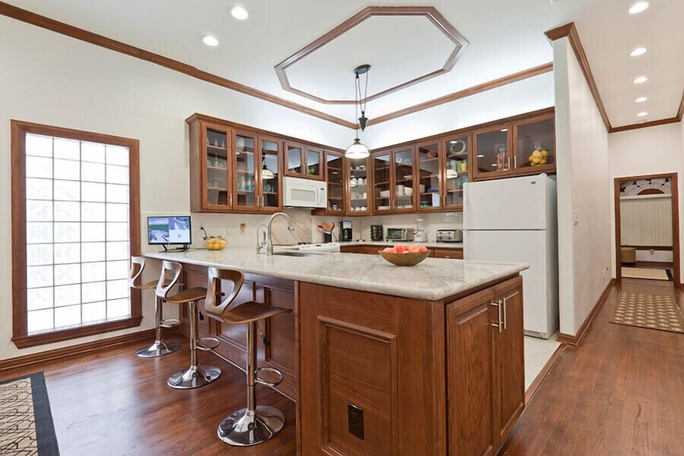 Cooking for the fam will feel like a vacation in itself. You'll have a view of the other living areas and plenty of natural light. 