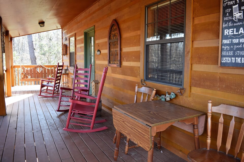 Relax on the back porch in a rocking chair, porch swing or at the table.