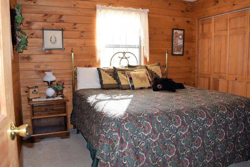 Bedroom 1 with a King bed, night stand and closet