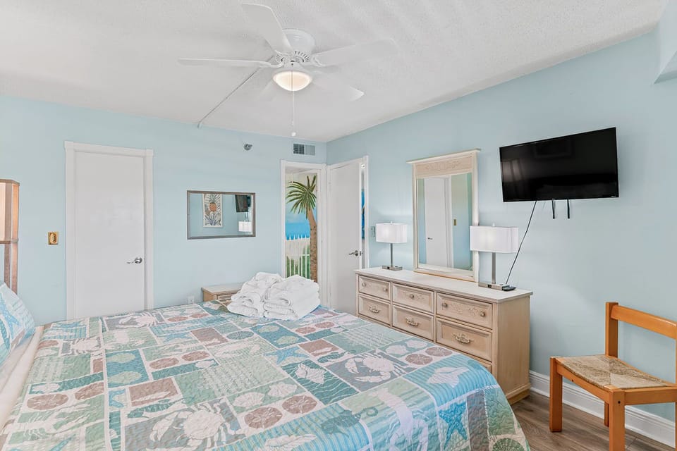 Walk-in closet, ceiling fan, dresser