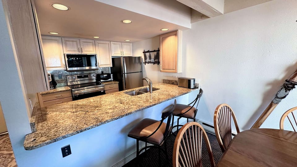 Kitchen with stainless steel appliances