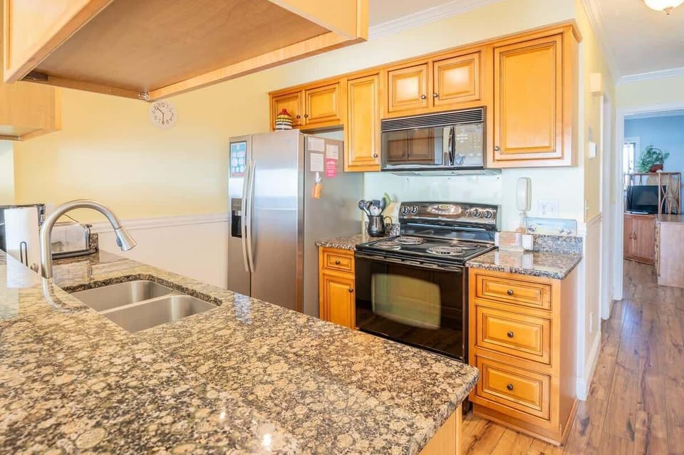 Kitchen with Stainless Sink & Pull Spray Faucet