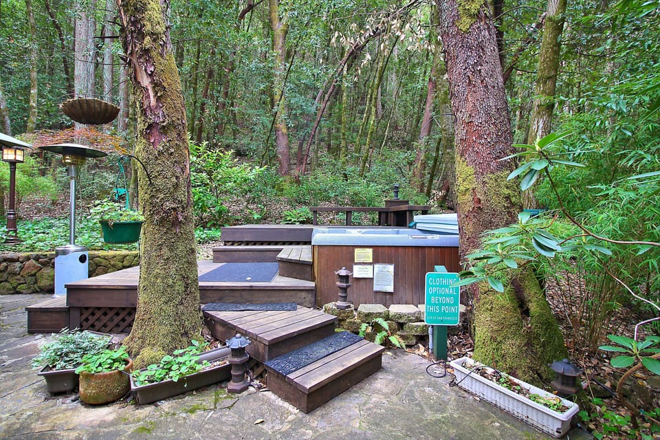 Multiple levels of yard and deck to enjoy the hot tub and friends.