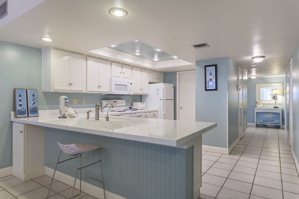 Entertaining in our open floor living, dining, and kitchen space is easy as pie.