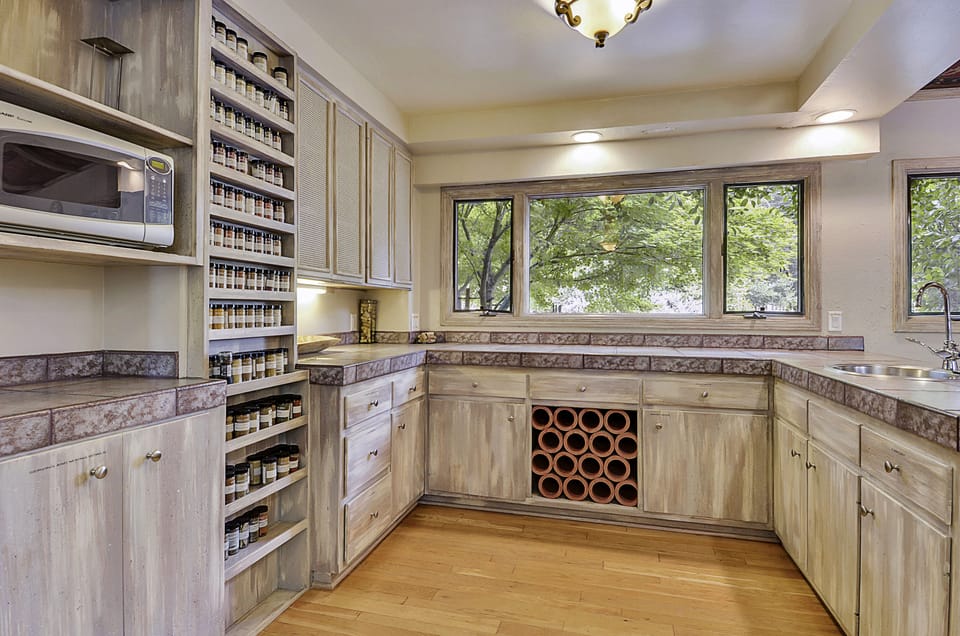 Home chefs will love the wall of spices - including one made and named just for Villa Tranquila.