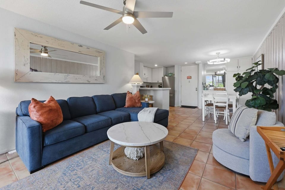 Enjoy the cool coastal breezes of Oceanside's 'Goldilocks Zone' with provided fans in our comfortable, tropically inspired living area.
