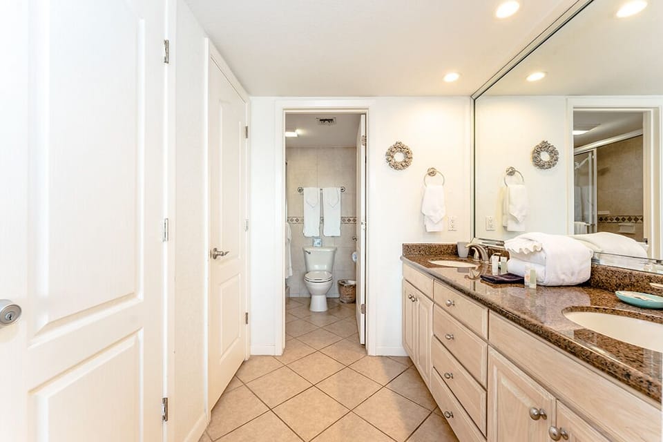 Soak up the sun then rinse away the sand. Our lovely primary bathroom has a wash room with a toilet room attached.