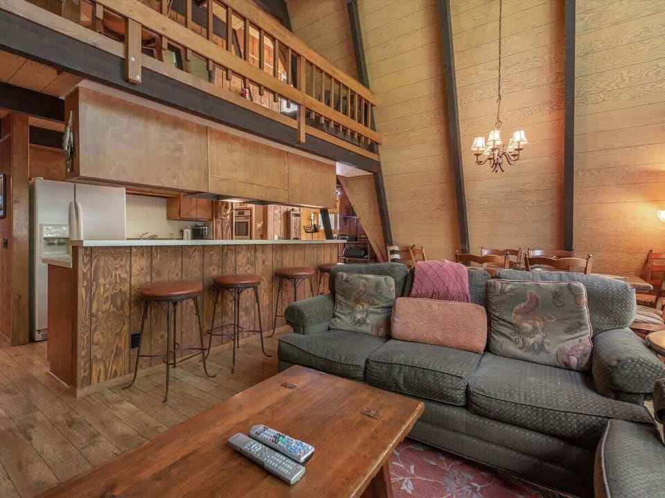 Formal living area open to dining area and breakfast bar of the kitchen. 