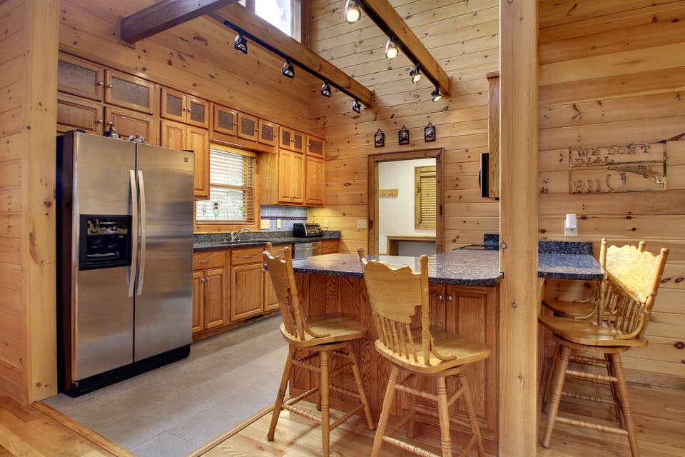You can enjoy preparing your families favorite meal in this fully furnished kitchen with a bright open design with stainless steel appliances.