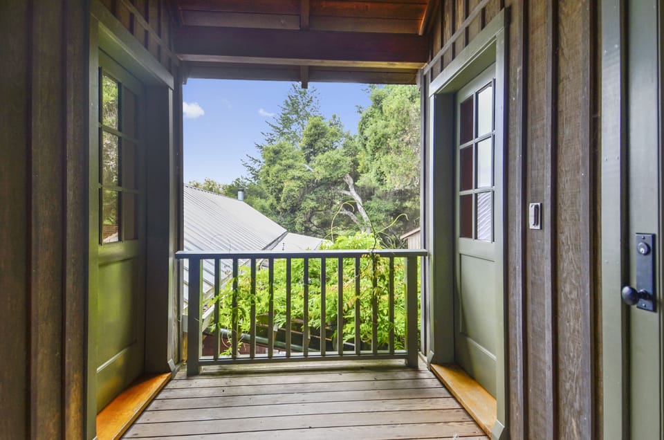 Upstairs landing leads to the two pool house bedrooms
