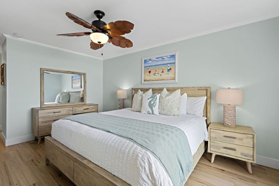 Peaceful and breezy bedroom with coastal decor and comfortable king bed