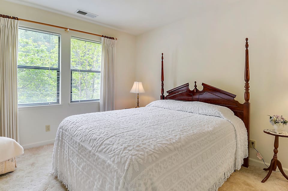 Upstairs - Second bedroom with Queen bed faces the river.