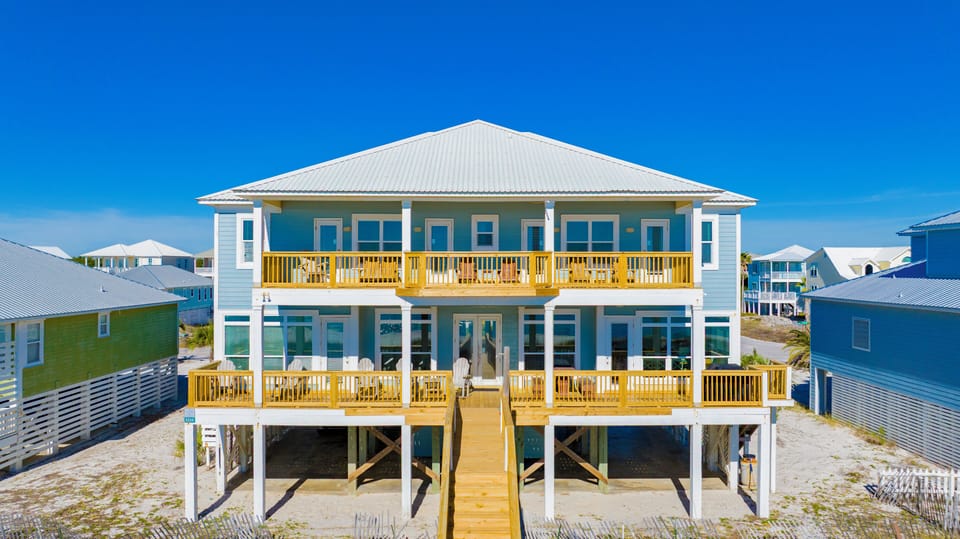 A multifamily, Gulf front home located in the Morgantown Community of Fort Morgan