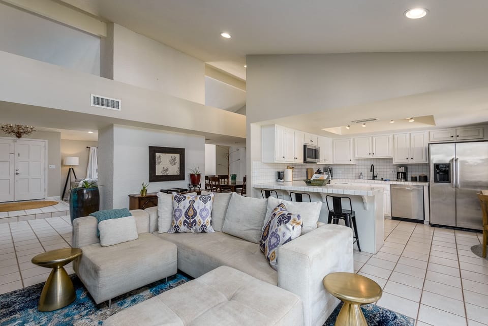 The open floor plan has sitting areas for cozy conversations or group gatherings